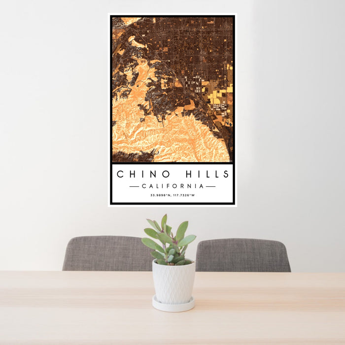 24x36 Chino Hills California Map Print Portrait Orientation in Ember Style Behind 2 Chairs Table and Potted Plant