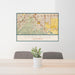 24x36 Chino Hills California Map Print Lanscape Orientation in Woodblock Style Behind 2 Chairs Table and Potted Plant