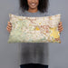 Person holding 20x12 Custom Chino Hills California Map Throw Pillow in Woodblock