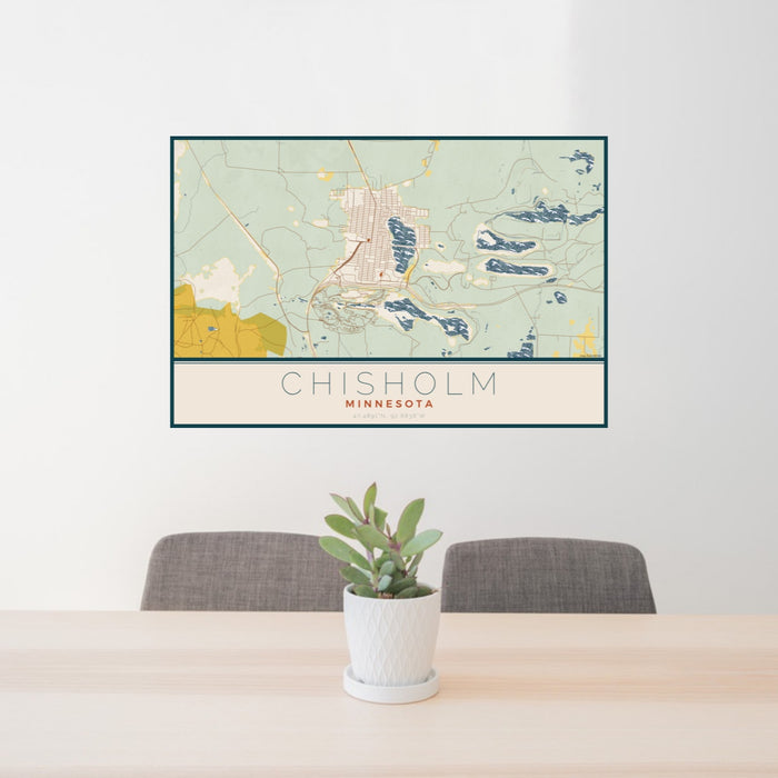 24x36 Chisholm Minnesota Map Print Landscape Orientation in Woodblock Style Behind 2 Chairs Table and Potted Plant