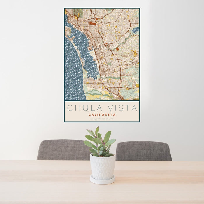 24x36 Chula Vista California Map Print Portrait Orientation in Woodblock Style Behind 2 Chairs Table and Potted Plant