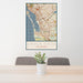 24x36 Chula Vista California Map Print Portrait Orientation in Woodblock Style Behind 2 Chairs Table and Potted Plant
