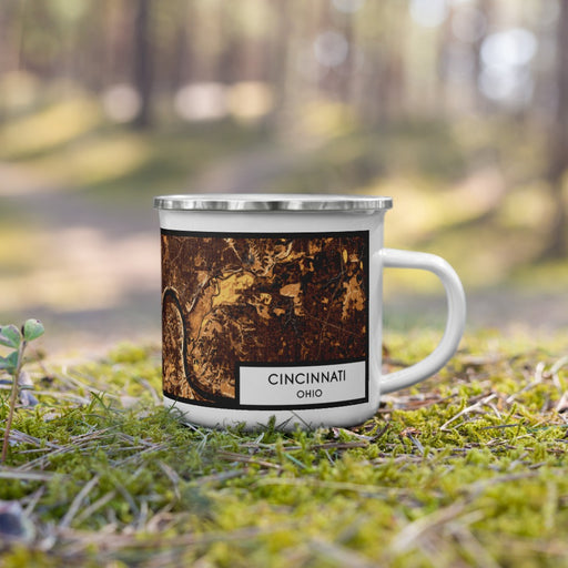 Right View Custom Cincinnati Ohio Map Enamel Mug in Ember on Grass With Trees in Background
