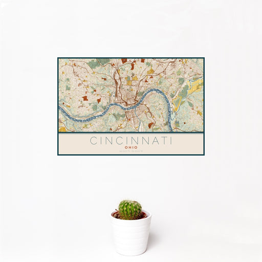 12x18 Cincinnati Ohio Map Print Landscape Orientation in Woodblock Style With Small Cactus Plant in White Planter