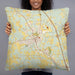 Person holding 22x22 Custom Clanton Alabama Map Throw Pillow in Woodblock