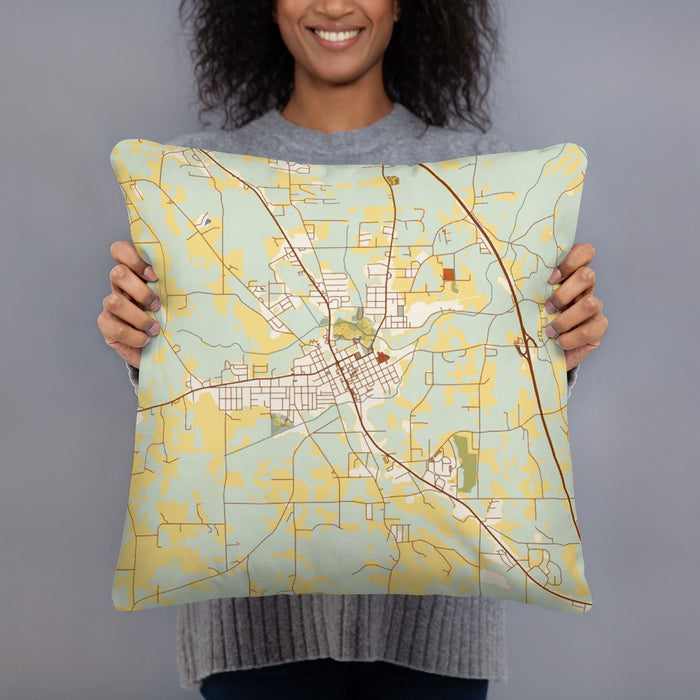 Person holding 18x18 Custom Clanton Alabama Map Throw Pillow in Woodblock