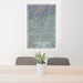 24x36 Claremont California Map Print Portrait Orientation in Afternoon Style Behind 2 Chairs Table and Potted Plant