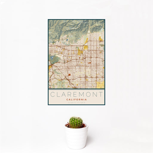 12x18 Claremont California Map Print Portrait Orientation in Woodblock Style With Small Cactus Plant in White Planter