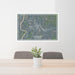 24x36 Claremont New Hampshire Map Print Lanscape Orientation in Afternoon Style Behind 2 Chairs Table and Potted Plant