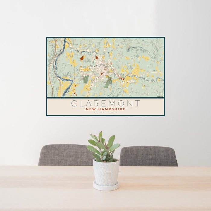 24x36 Claremont New Hampshire Map Print Lanscape Orientation in Woodblock Style Behind 2 Chairs Table and Potted Plant