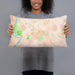 Person holding 20x12 Custom Claremont New Hampshire Map Throw Pillow in Watercolor