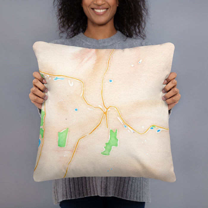 Person holding 18x18 Custom Claremont New Hampshire Map Throw Pillow in Watercolor