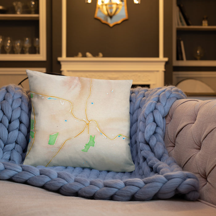 Custom Claremont New Hampshire Map Throw Pillow in Watercolor on Cream Colored Couch