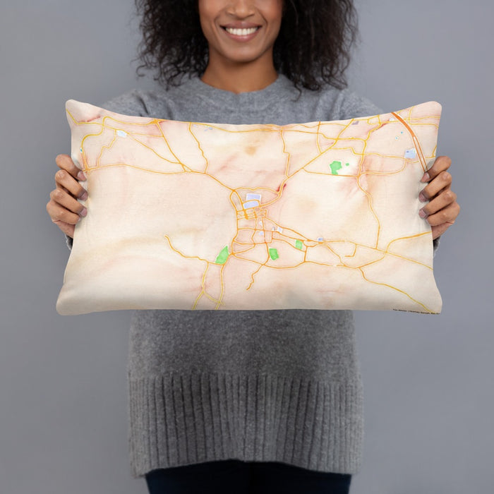 Person holding 20x12 Custom Clarksville Tennessee Map Throw Pillow in Watercolor