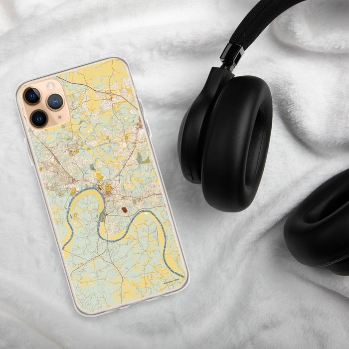 Custom Clarksville Tennessee Map Phone Case in Woodblock on Table with Black Headphones