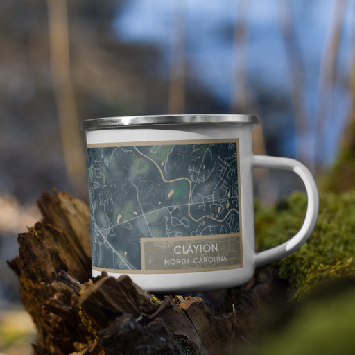 Right View Custom Clayton North Carolina Map Enamel Mug in Afternoon on Grass With Trees in Background