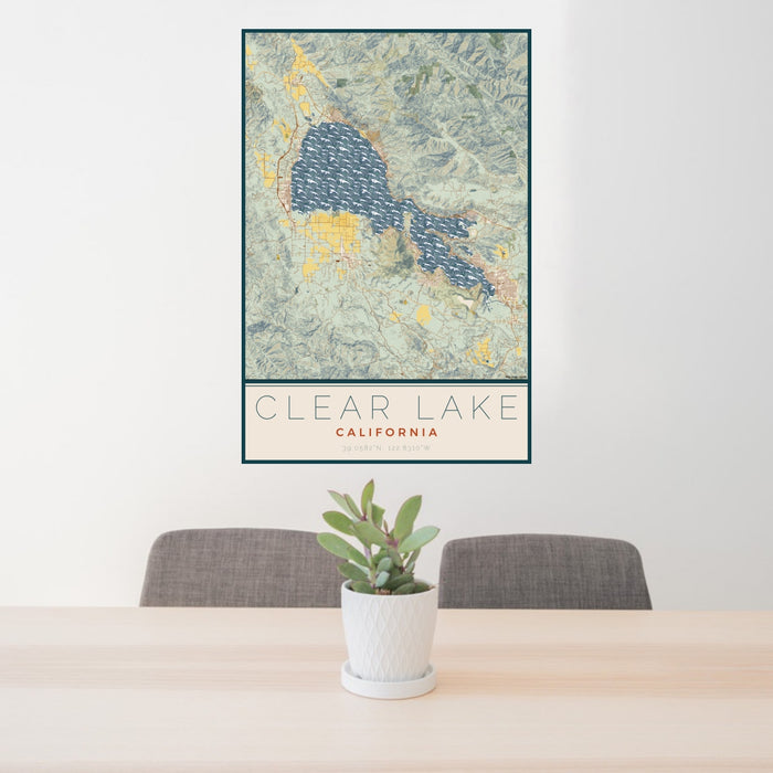 24x36 Clear Lake California Map Print Portrait Orientation in Woodblock Style Behind 2 Chairs Table and Potted Plant