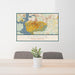 24x36 Clemson South Carolina Map Print Landscape Orientation in Woodblock Style Behind 2 Chairs Table and Potted Plant