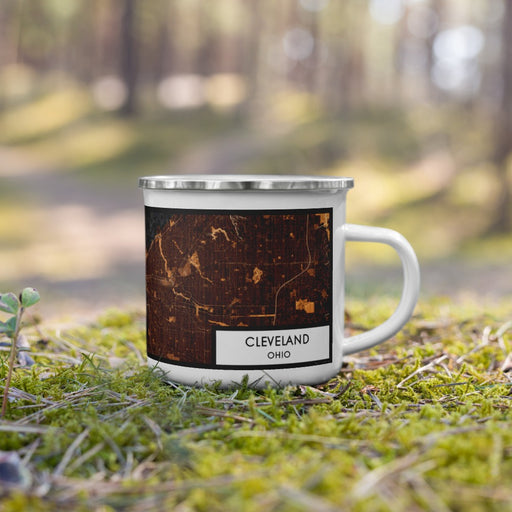 Right View Custom Cleveland Ohio Map Enamel Mug in Ember on Grass With Trees in Background