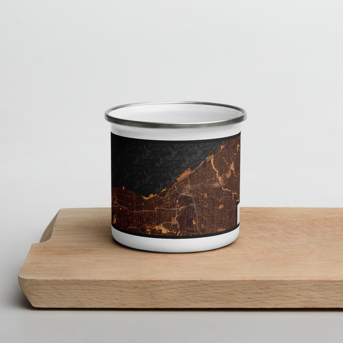 Front View Custom Cleveland Ohio Map Enamel Mug in Ember on Cutting Board