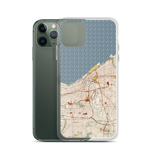 Custom Cleveland Ohio Map Phone Case in Woodblock on Table with Laptop and Plant