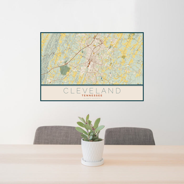 24x36 Cleveland Tennessee Map Print Lanscape Orientation in Woodblock Style Behind 2 Chairs Table and Potted Plant