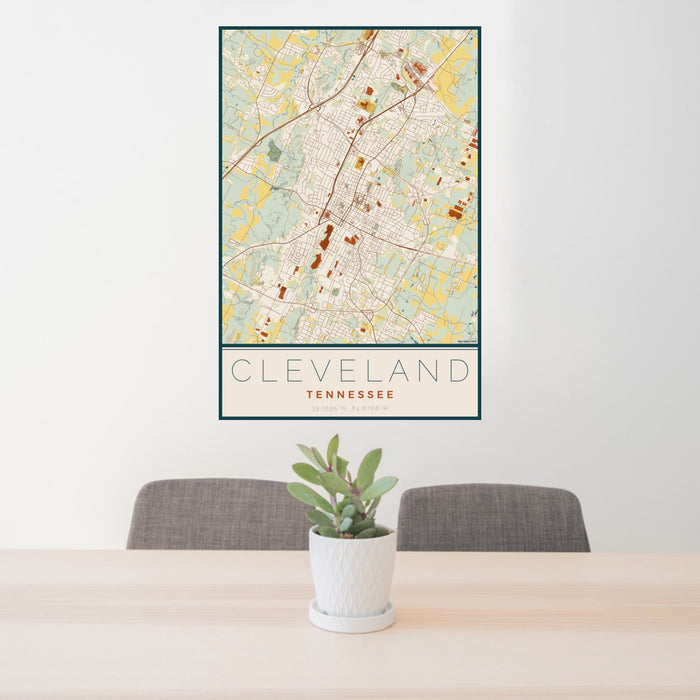 24x36 Cleveland Tennessee Map Print Portrait Orientation in Woodblock Style Behind 2 Chairs Table and Potted Plant