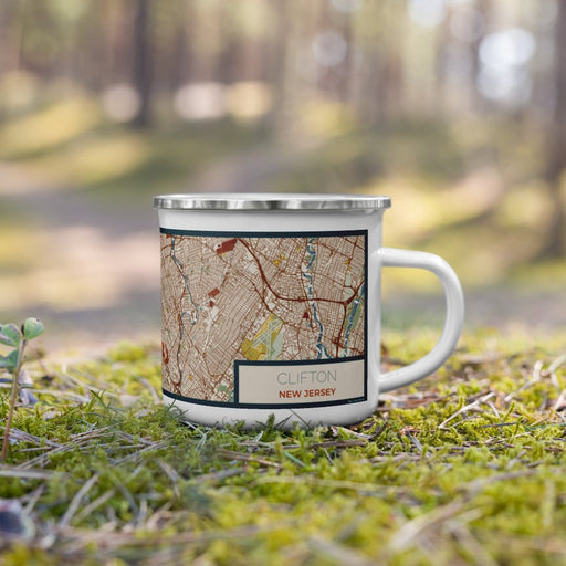 Right View Custom Clifton New Jersey Map Enamel Mug in Woodblock on Grass With Trees in Background