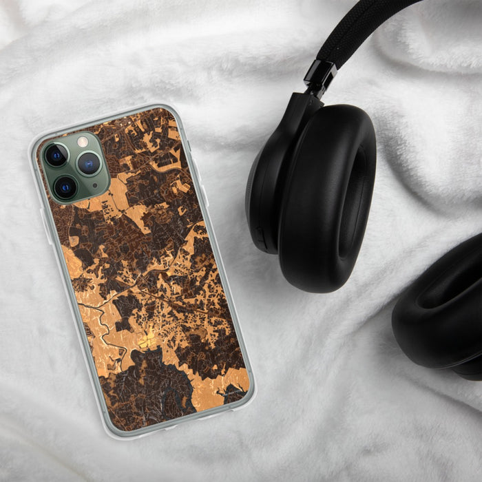 Custom Clifton Virginia Map Phone Case in Ember on Table with Black Headphones