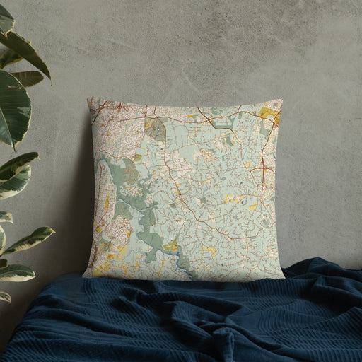 Custom Clifton Virginia Map Throw Pillow in Woodblock on Bedding Against Wall