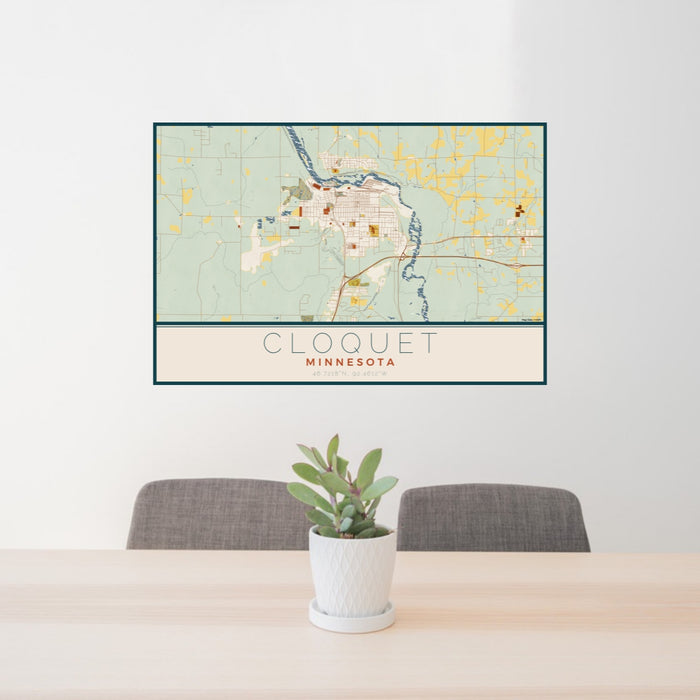 24x36 Cloquet Minnesota Map Print Lanscape Orientation in Woodblock Style Behind 2 Chairs Table and Potted Plant