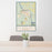 24x36 Cloquet Minnesota Map Print Portrait Orientation in Woodblock Style Behind 2 Chairs Table and Potted Plant