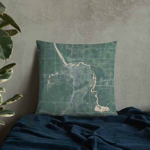 Custom Cloquet Minnesota Map Throw Pillow in Afternoon on Bedding Against Wall