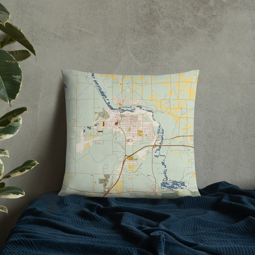 Custom Cloquet Minnesota Map Throw Pillow in Woodblock on Bedding Against Wall