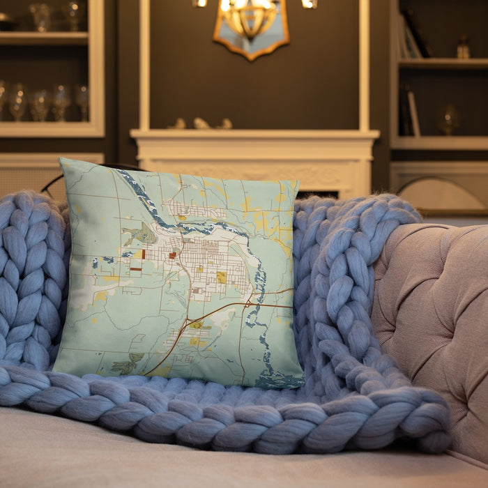 Custom Cloquet Minnesota Map Throw Pillow in Woodblock on Cream Colored Couch