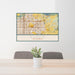 24x36 Clovis California Map Print Lanscape Orientation in Woodblock Style Behind 2 Chairs Table and Potted Plant
