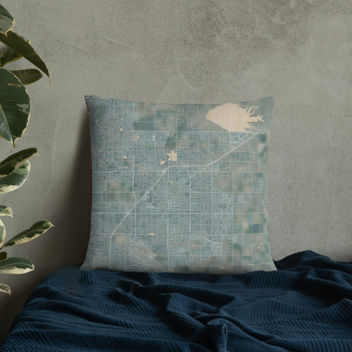 Custom Clovis California Map Throw Pillow in Afternoon on Bedding Against Wall