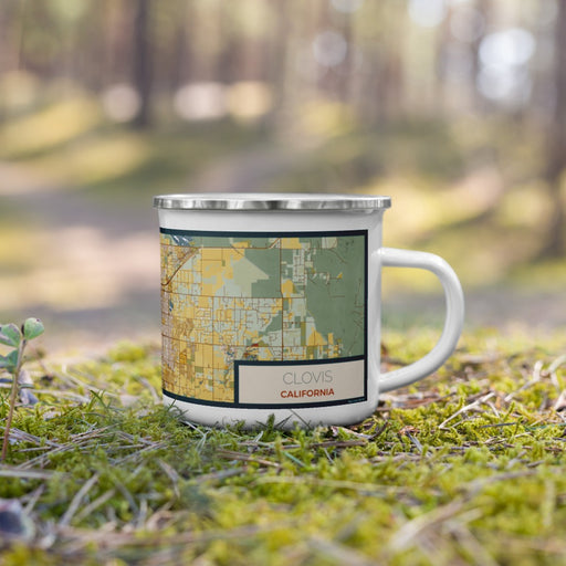 Right View Custom Clovis California Map Enamel Mug in Woodblock on Grass With Trees in Background