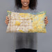 Person holding 20x12 Custom Clovis California Map Throw Pillow in Woodblock