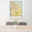 24x36 Coachella California Map Print Portrait Orientation in Woodblock Style Behind 2 Chairs Table and Potted Plant