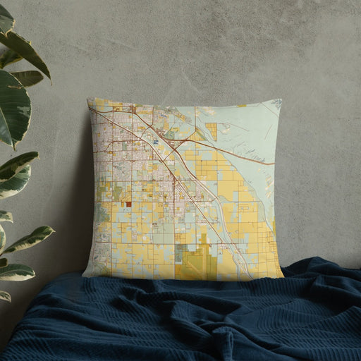Custom Coachella California Map Throw Pillow in Woodblock on Bedding Against Wall