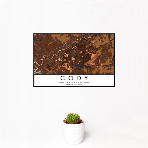 12x18 Cody Wyoming Map Print Landscape Orientation in Ember Style With Small Cactus Plant in White Planter