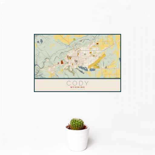 12x18 Cody Wyoming Map Print Landscape Orientation in Woodblock Style With Small Cactus Plant in White Planter