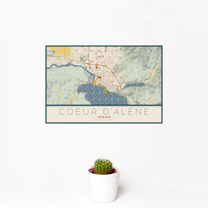 12x18 Coeur d'Alene Idaho Map Print Landscape Orientation in Woodblock Style With Small Cactus Plant in White Planter