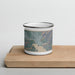Front View Custom Coeur d'Alene Idaho Map Enamel Mug in Afternoon on Cutting Board