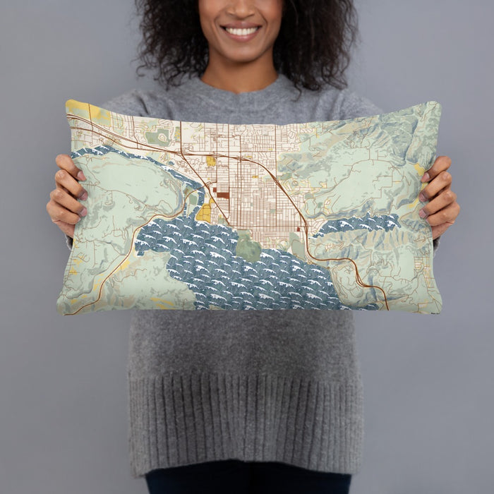 Person holding 20x12 Custom Coeur d'Alene Idaho Map Throw Pillow in Woodblock