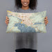 Person holding 20x12 Custom Coeur d'Alene Idaho Map Throw Pillow in Woodblock