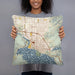 Person holding 18x18 Custom Coeur d'Alene Idaho Map Throw Pillow in Woodblock