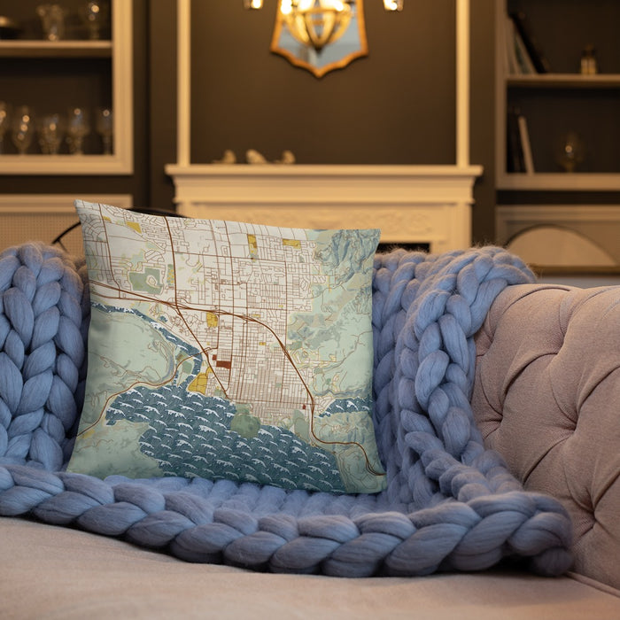 Custom Coeur d'Alene Idaho Map Throw Pillow in Woodblock on Cream Colored Couch