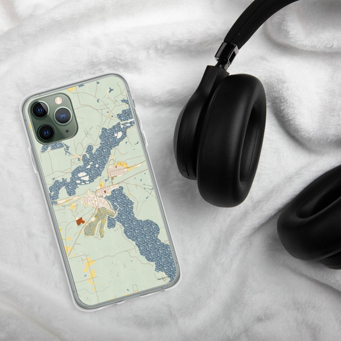 Custom Coleraine Minnesota Map Phone Case in Woodblock on Table with Black Headphones
